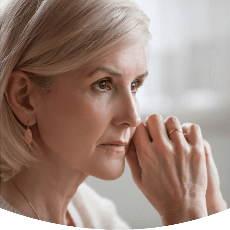 old women thinking about cataract surgery